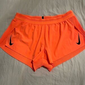 NIKE AEROSWIFT running shorts sz M like new bright orange w/ black Nike check